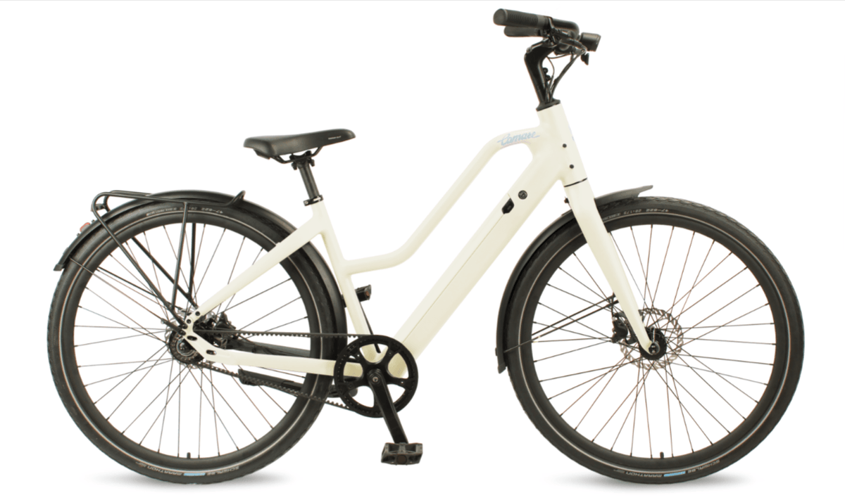 Comate Motion CC Elite e-bike in white, featuring a lightweight design and Gates Carbon Drive system for smooth rides.