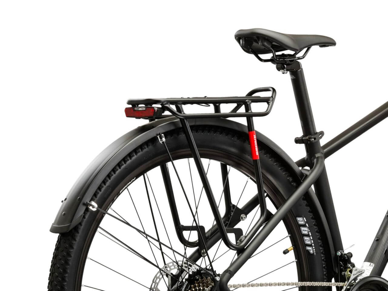 A close-up of the rear section of a KROSS Hexagon X200 EQ mountainbike, showcasing the sturdy rack and tire.