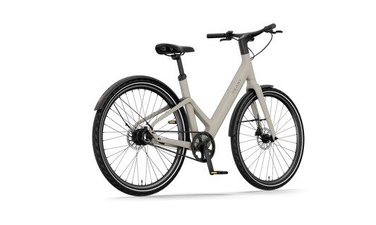 W1 PRO elektrische fiets in beige met zwarte wielen en een moderne uitstraling.